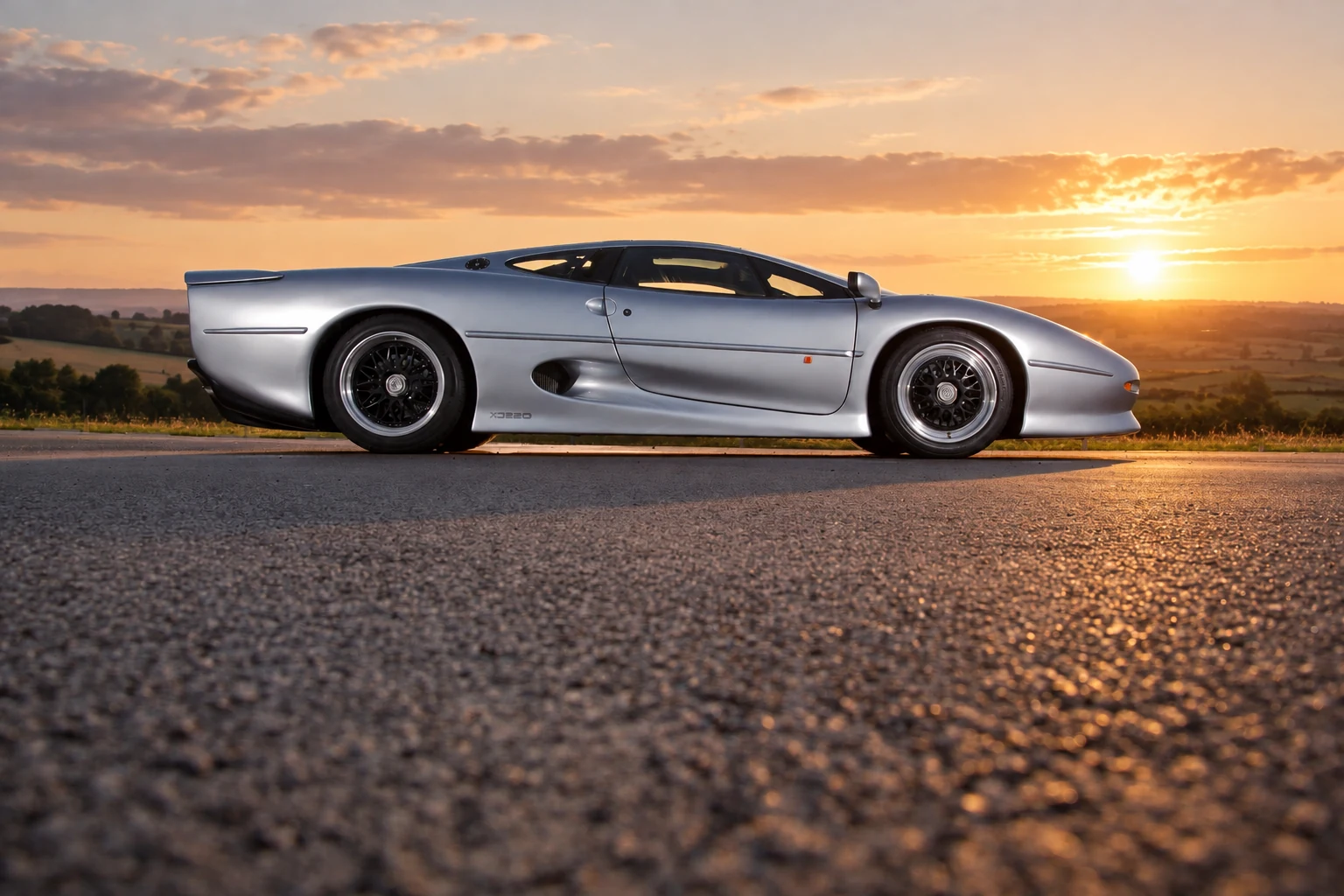 Silver Jaguar XJ220 in side profile