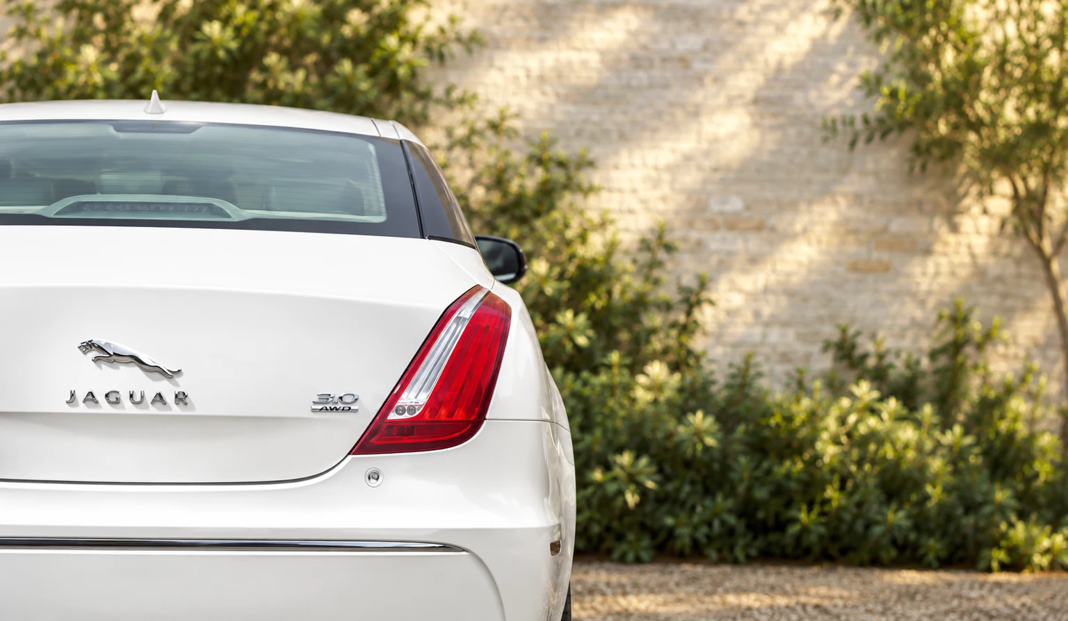 The 3.0 AWD badge identified the drivetrain