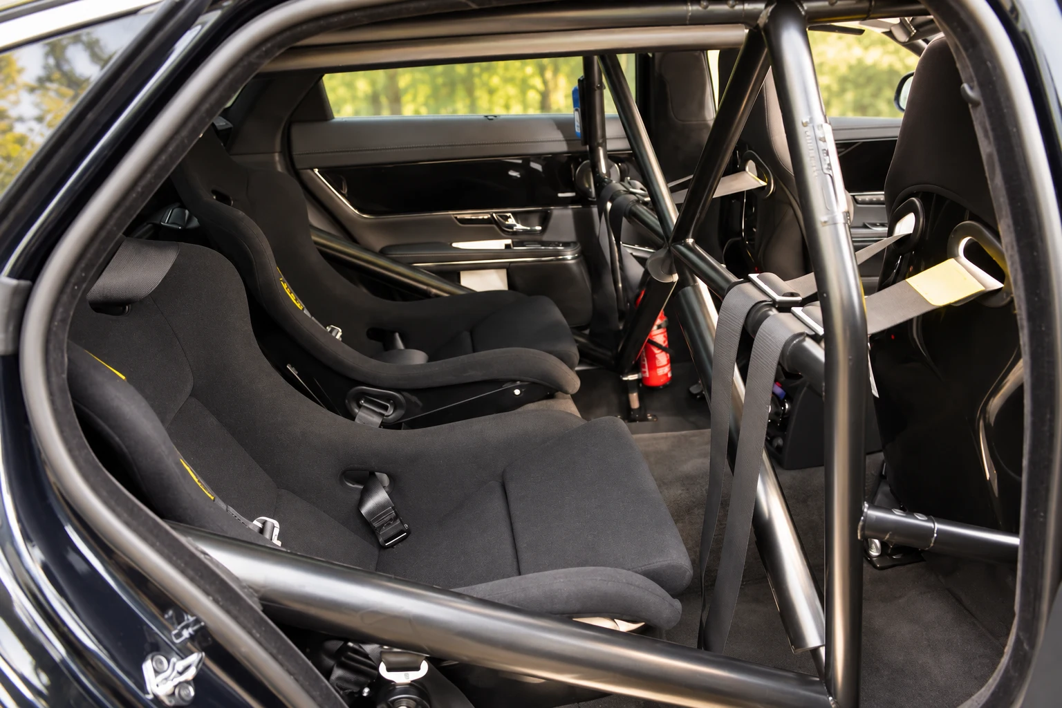 Rear racing seats, harnesses and the bespoke cage